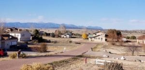 A view of houses and a road in the distance.